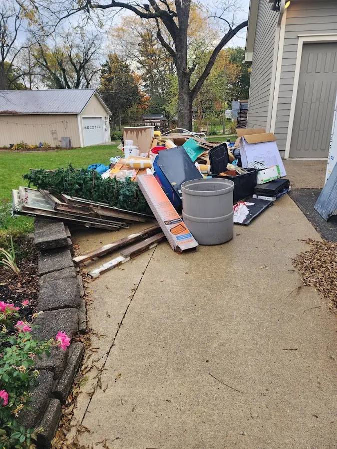 Dumpster being loaded with debris for Commercial Dumpster Rental in Pacific